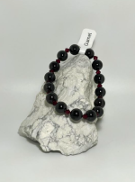 8 mm Garnet with accent crystals